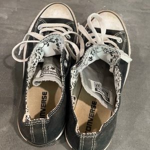 Black converse with floral print inside